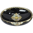 cuba de cerâmica preta com detalhes dourado