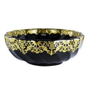 cuba de cerâmica preta com detalhes dourados