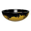 cuba de cerâmica preta com detalhe bronze