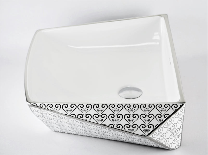 cuba de cerâmica branca com detalhes prata