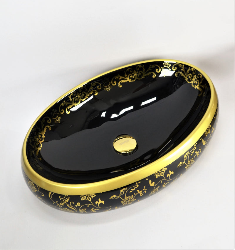 cuba de cerâmica preta com detalhes dourado